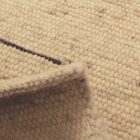 Vastag gyapjú szőnyeg 60x106 egyszínű nappali szőnyeg