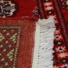 Pakisztáni szőnyeg bordó Bukhara 76x128 kézi csomózású szőnyeg