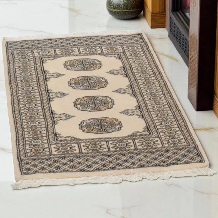 Pakisztáni szőnyeg bézs Bukhara 63x91 kézi csomózású szőnyeg