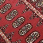 Pakisztáni szőnyeg rózsaszín Bokhara 77x130 kézi csomózású szőnyeg