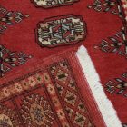 Pakisztáni szőnyeg rózsaszín Bokhara 77x130 kézi csomózású szőnyeg